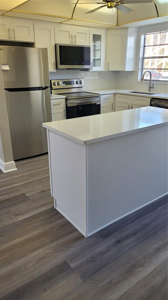 Island adds extra counter space.