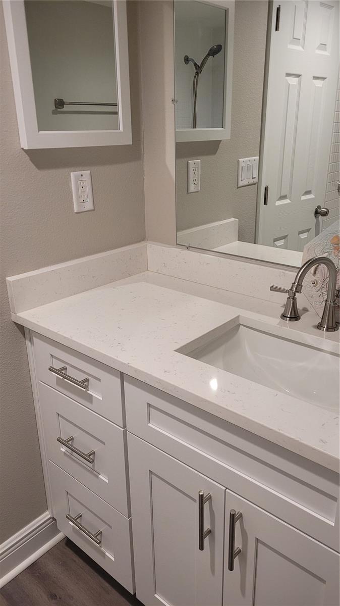 New vanity with quartz countertops