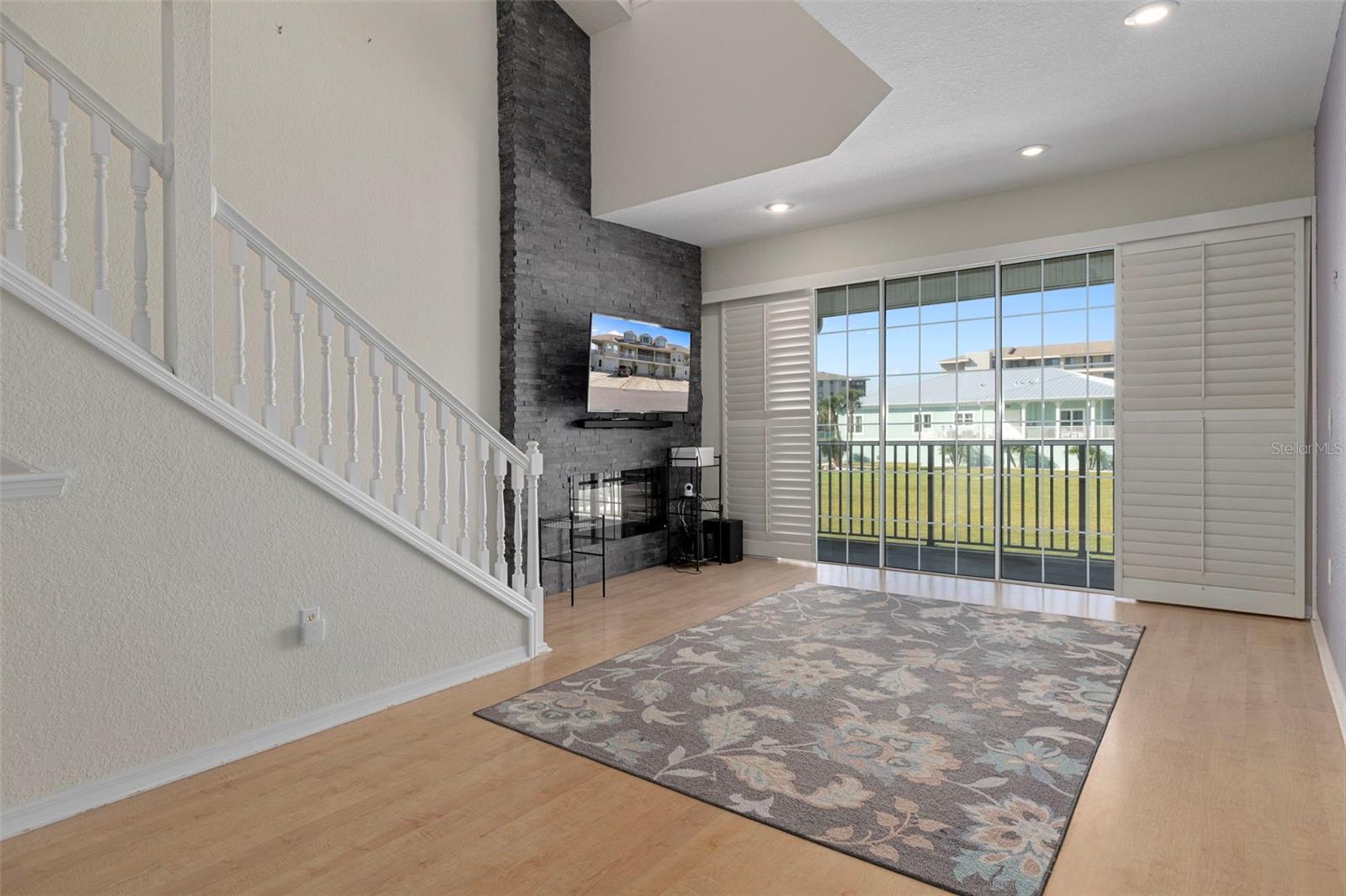Living room with fireplace wall