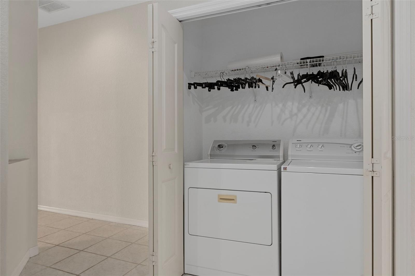 Laundry closet in kitchen