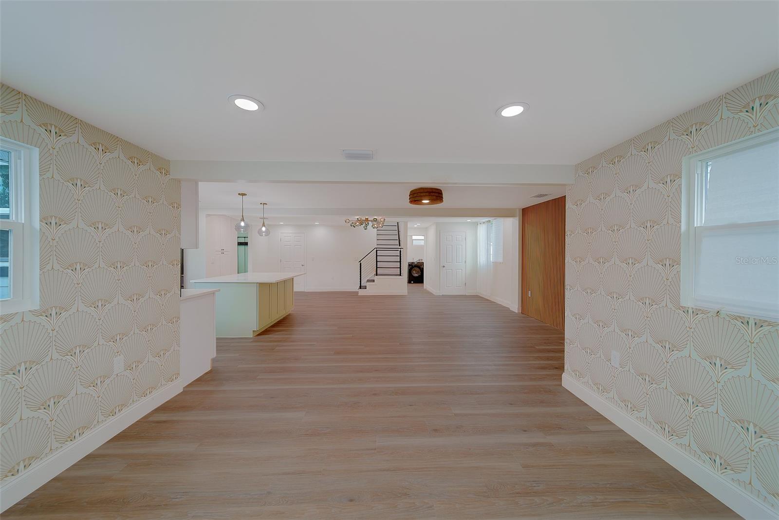 Right inside front door entryway/foyer, looking into the great room