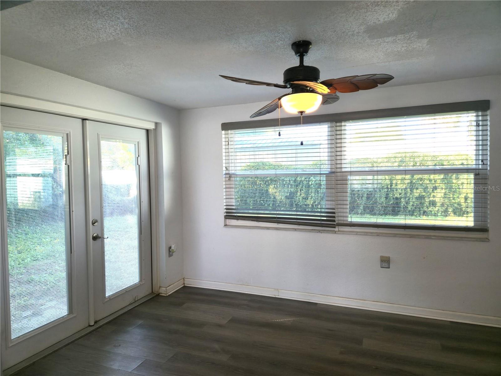 ...to new French doors, entry door, and ceiling fans