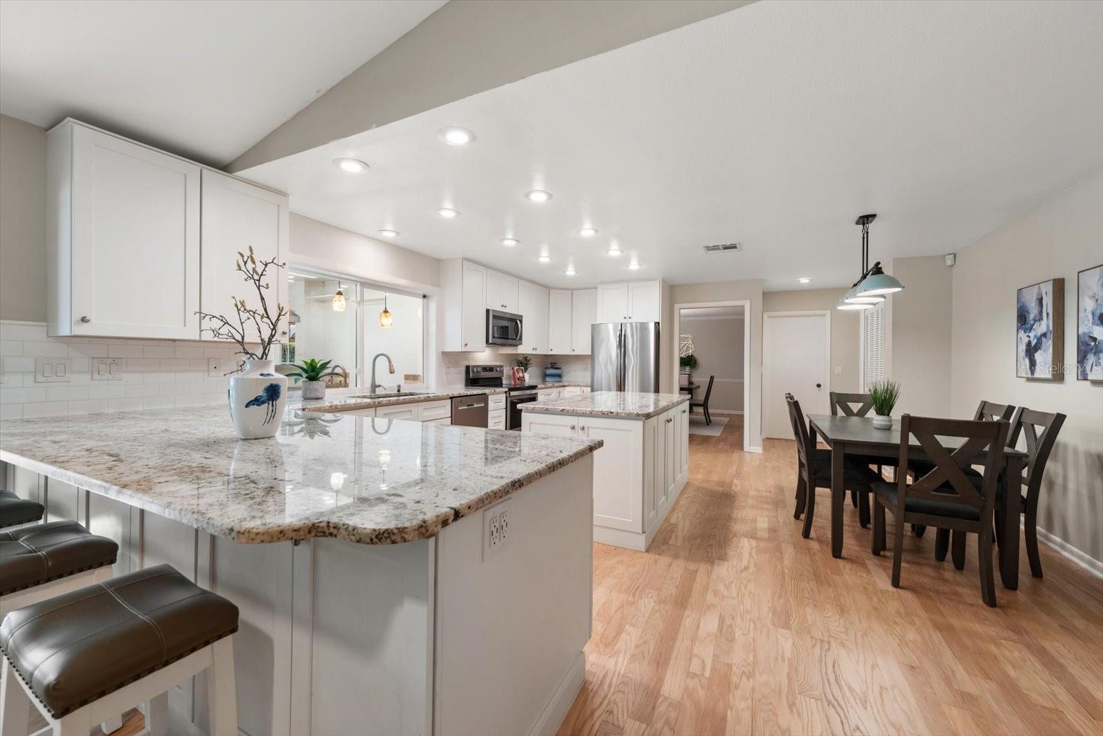 Counter height seating and an eat in kitchen