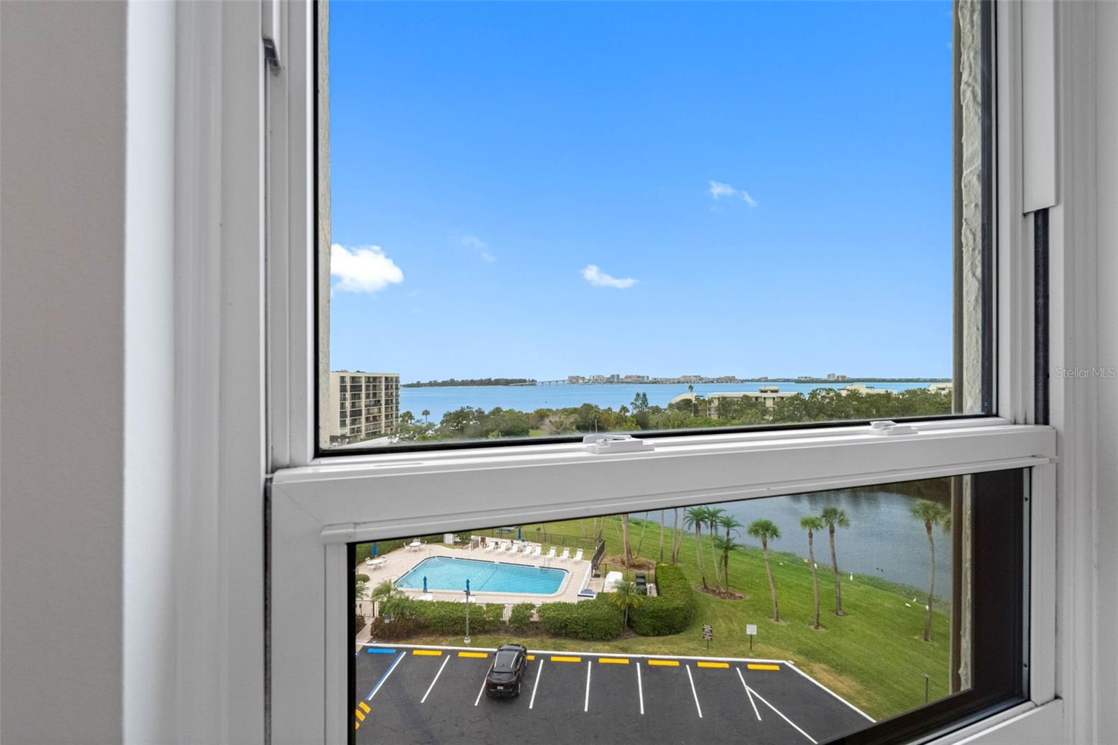 Updated kitchen window and storm shutters