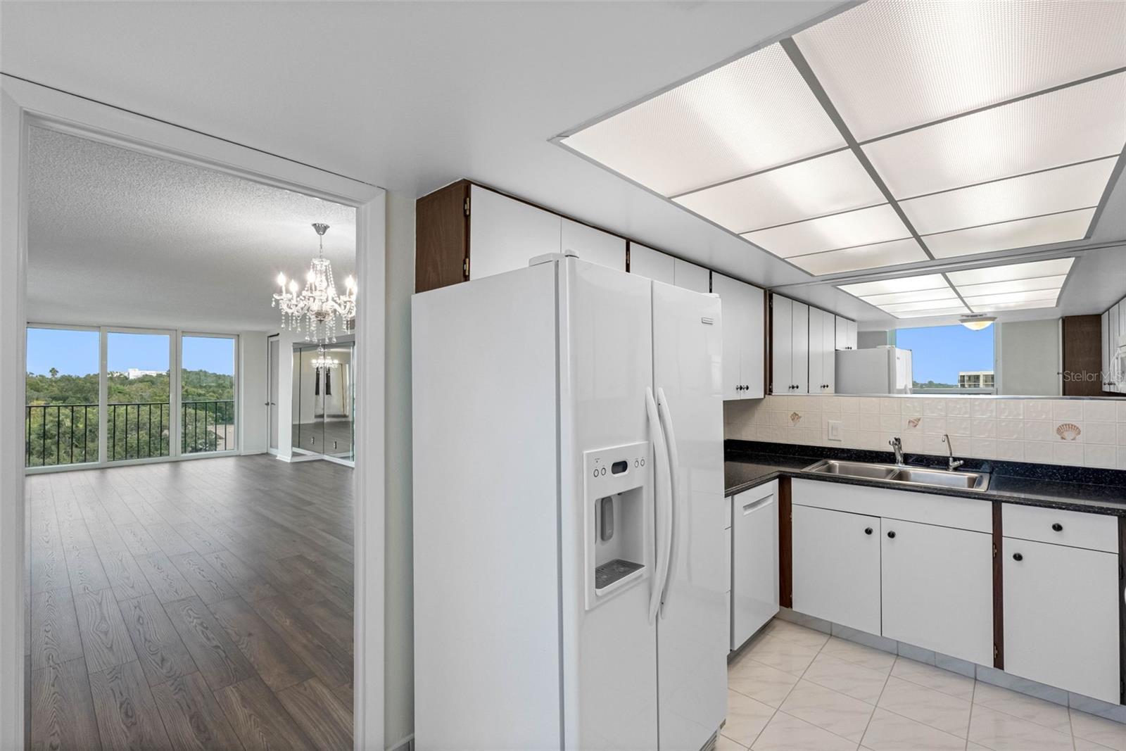 Kitchen is off of dining/living