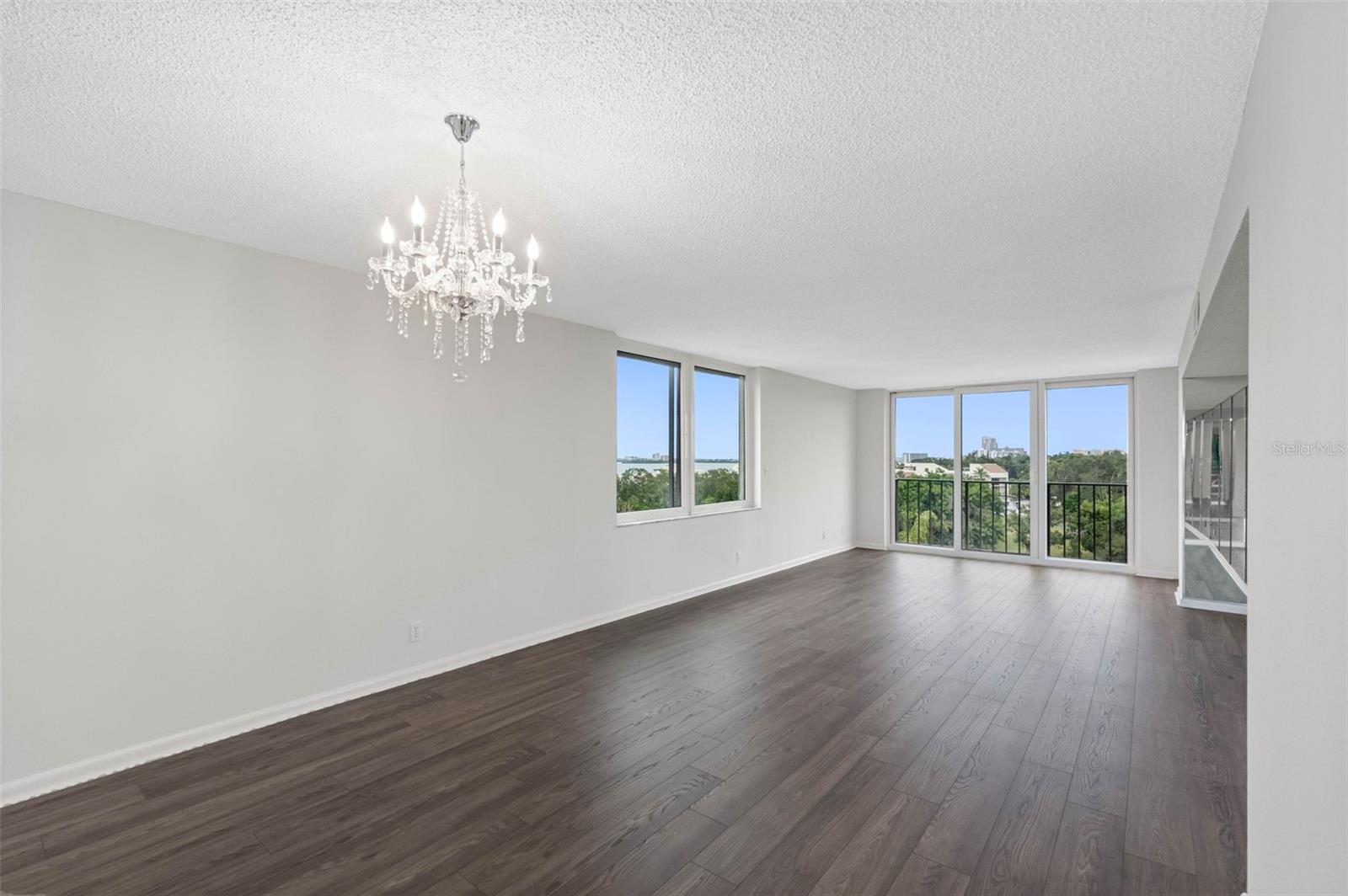 Updated window with storm shutters