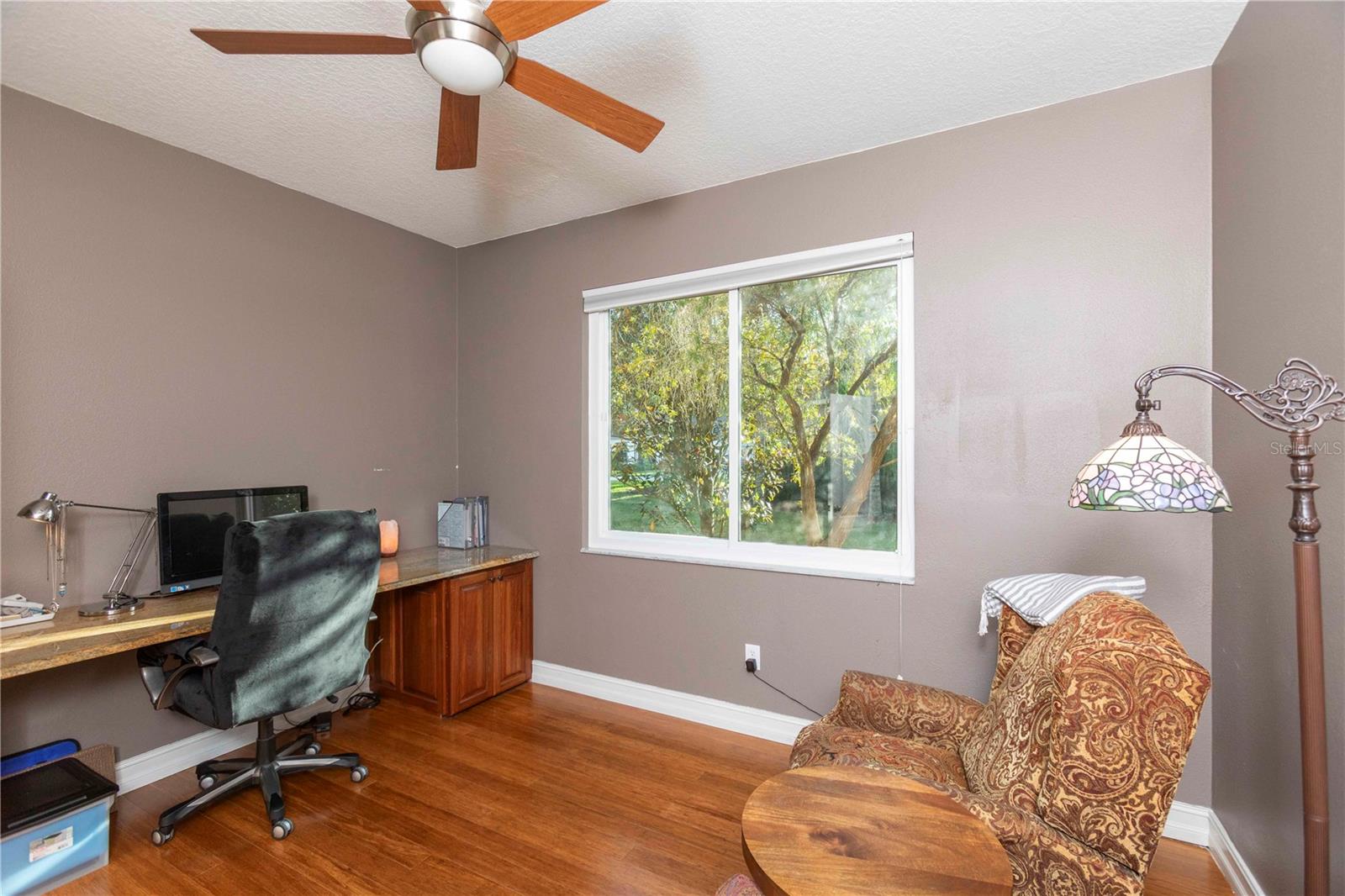 Office with Built-In File Cabinets and Granite Desktop