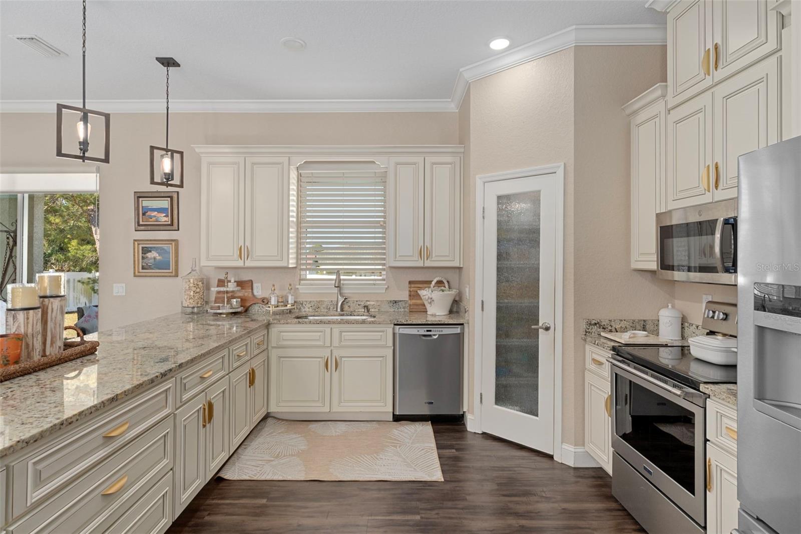 Beautifully appointed kitchen with walk-in pantry.