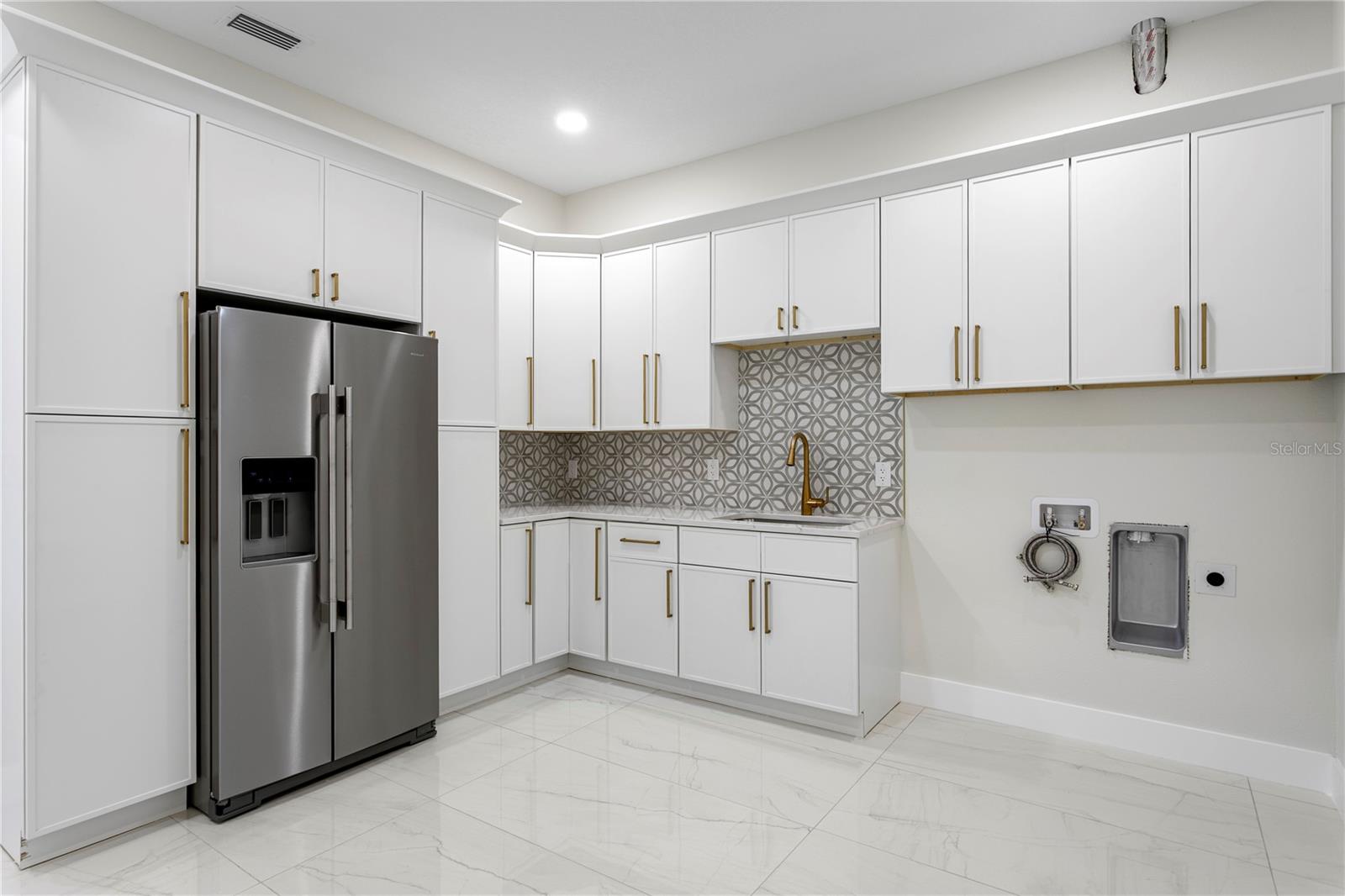 Utility Pantry behind Kitchen