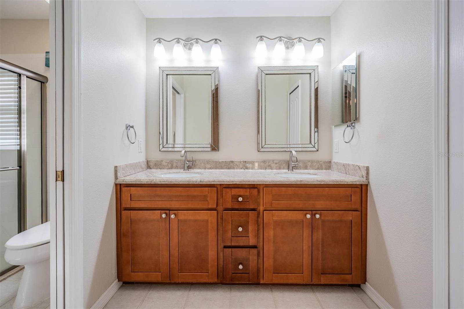 Double vanity provides additional storage