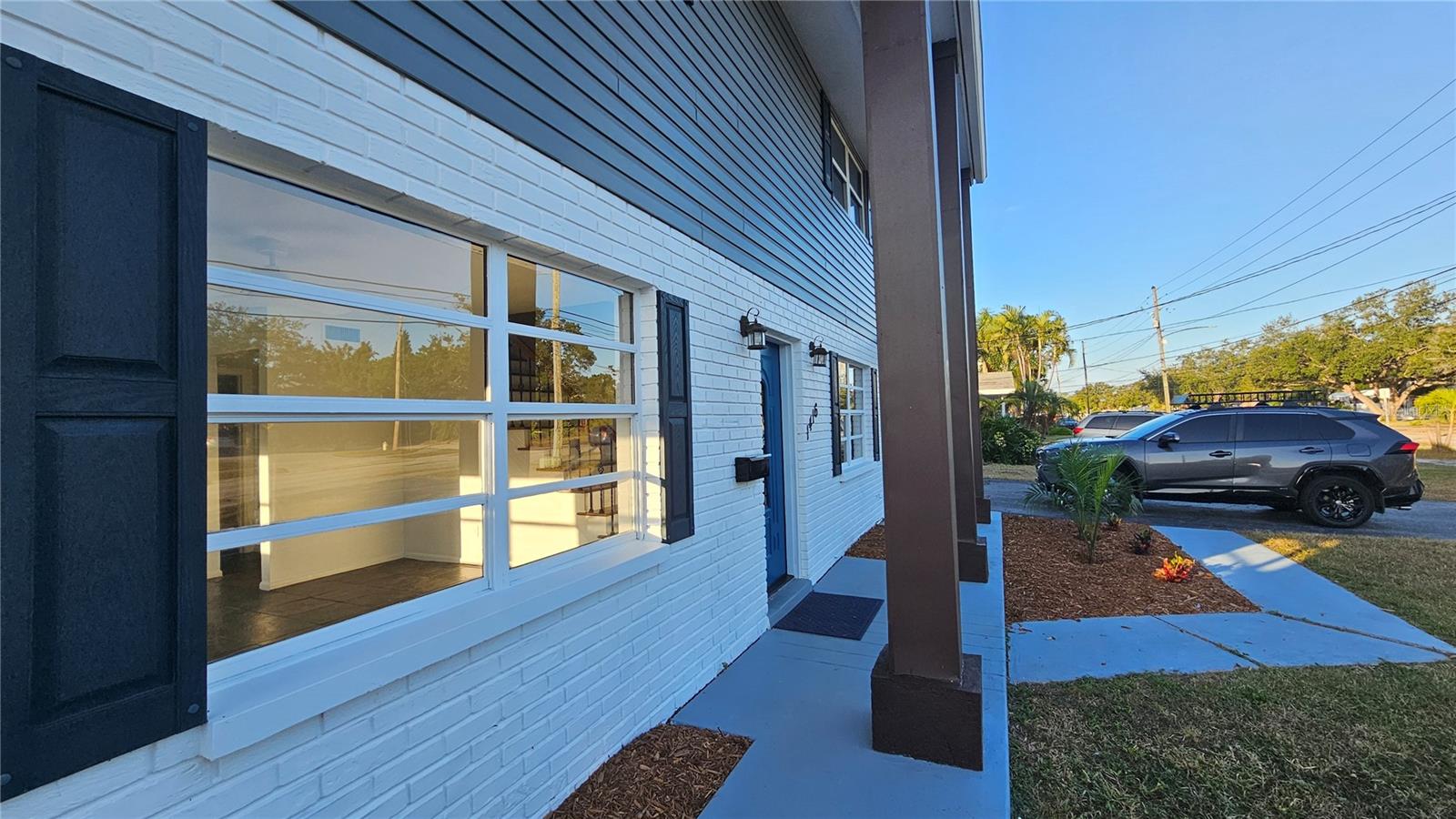 "Natural Light" GLOWS (not enhanced) through the living room, flex-space, lanai and pool with the morning sun. Cell phone photo.