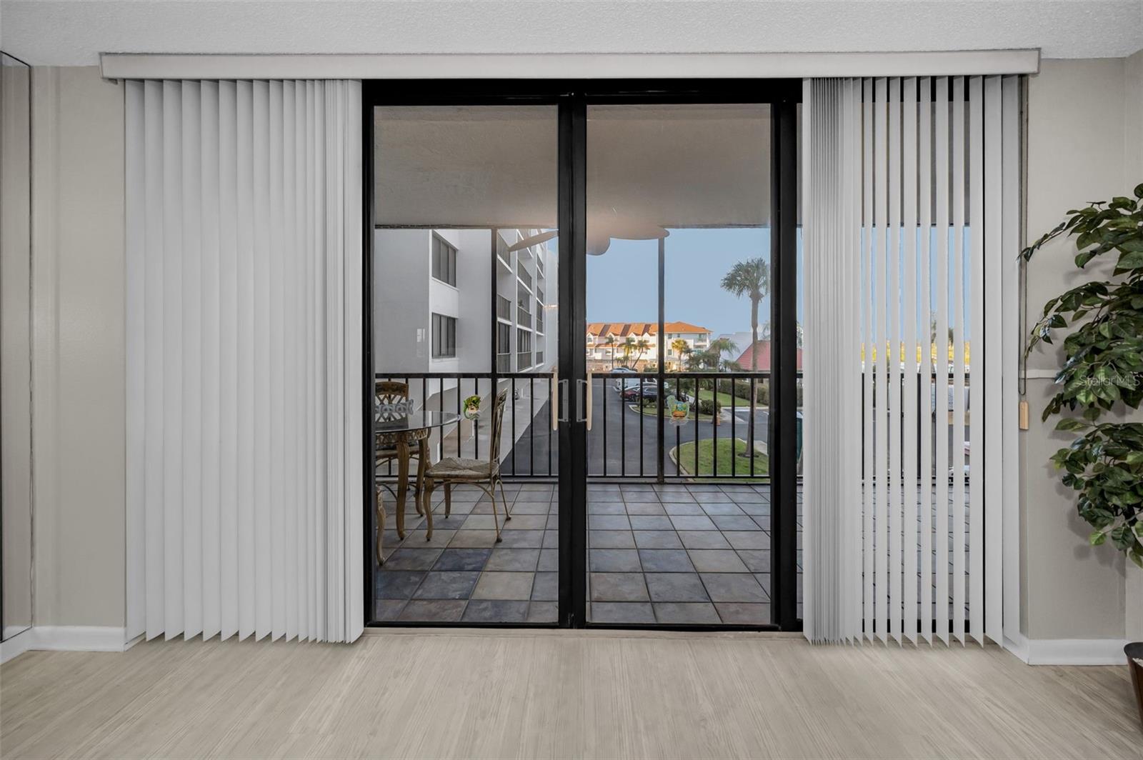 Sliding Glass Doors to the Balcony