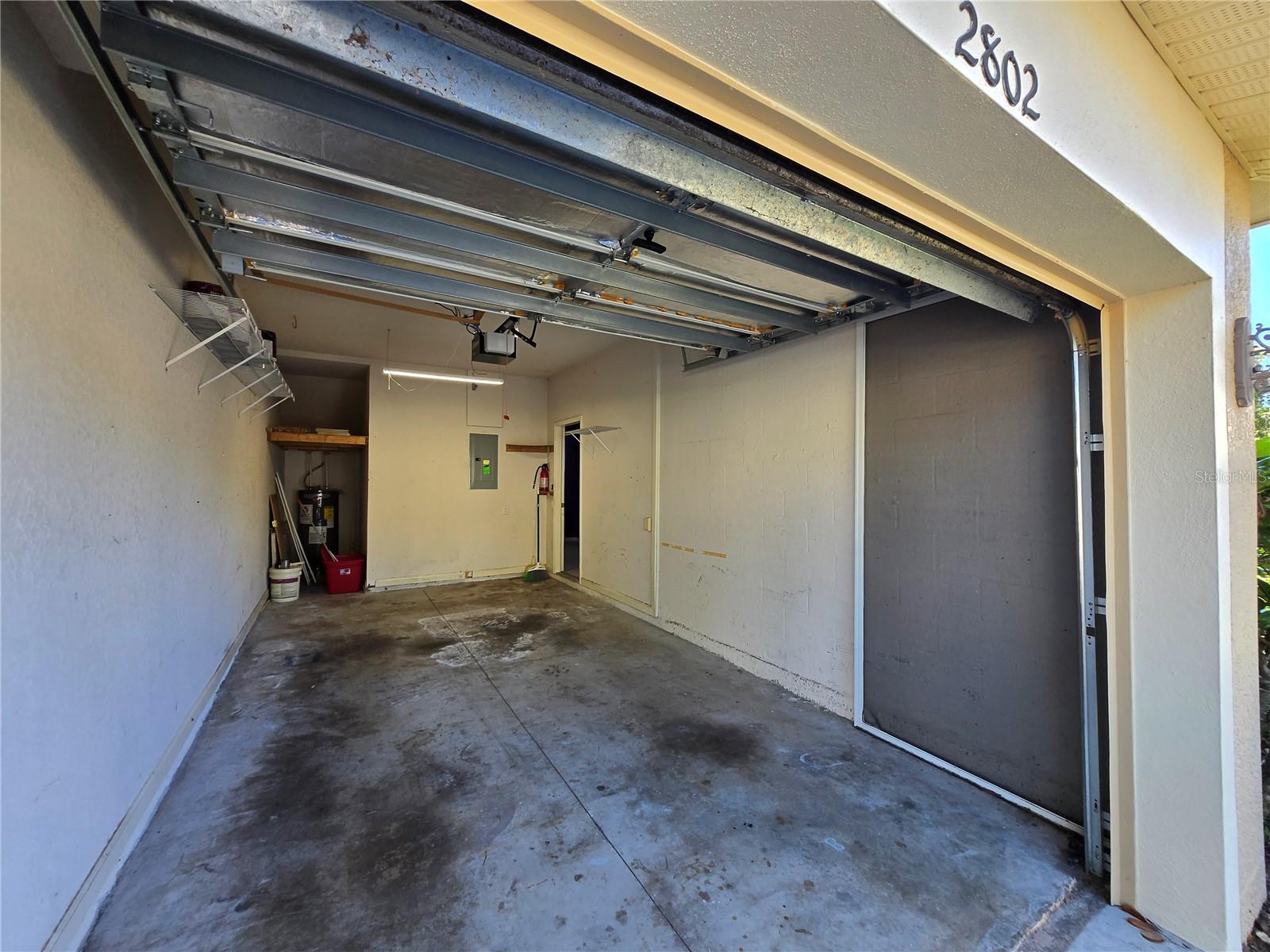 Right side door leads to kitchen and half bath.