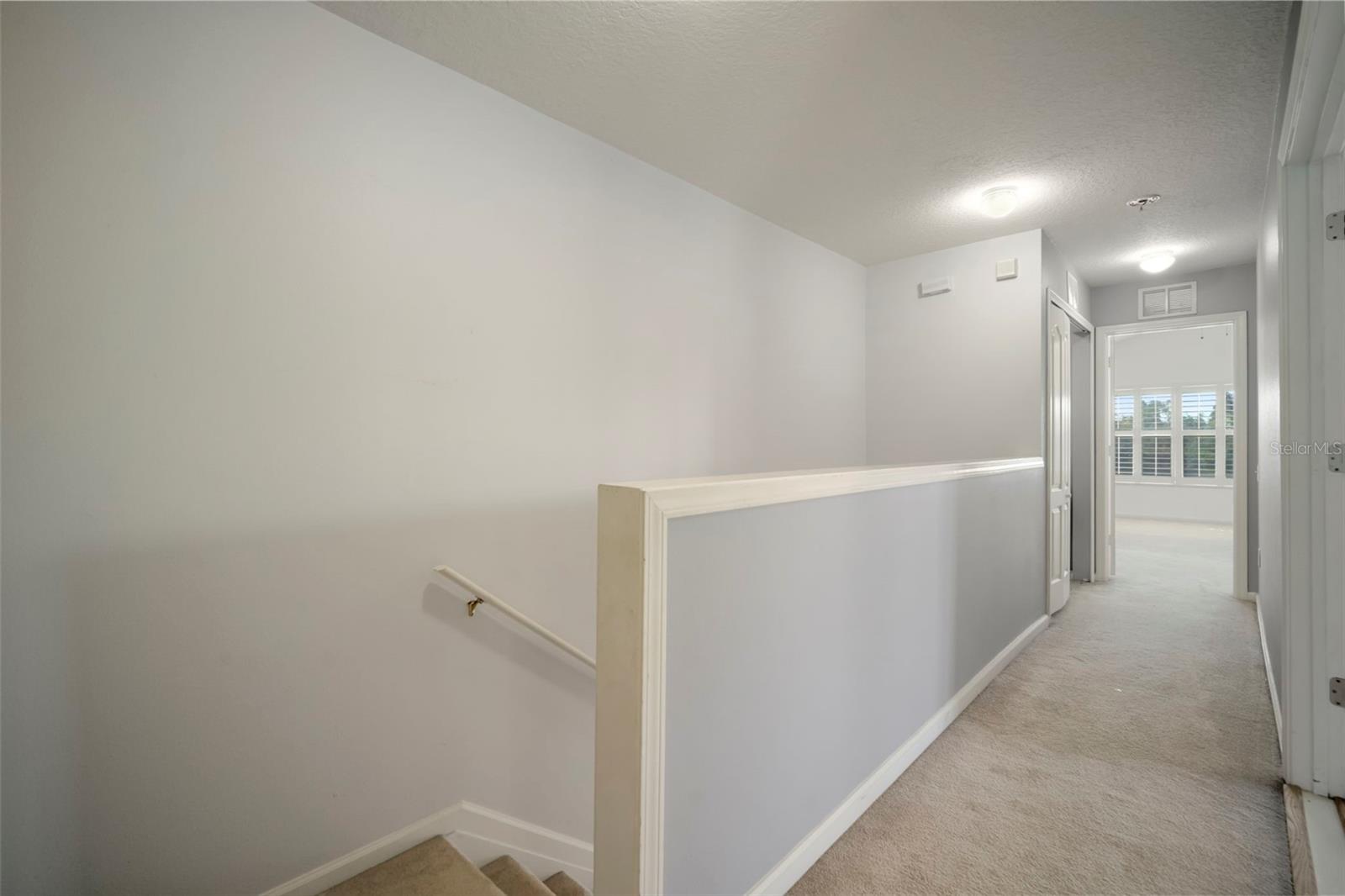 Making a left turn at the top of the stairs will bring you to the Master Ensuite. Laundry room located right next to master at end of hallway.