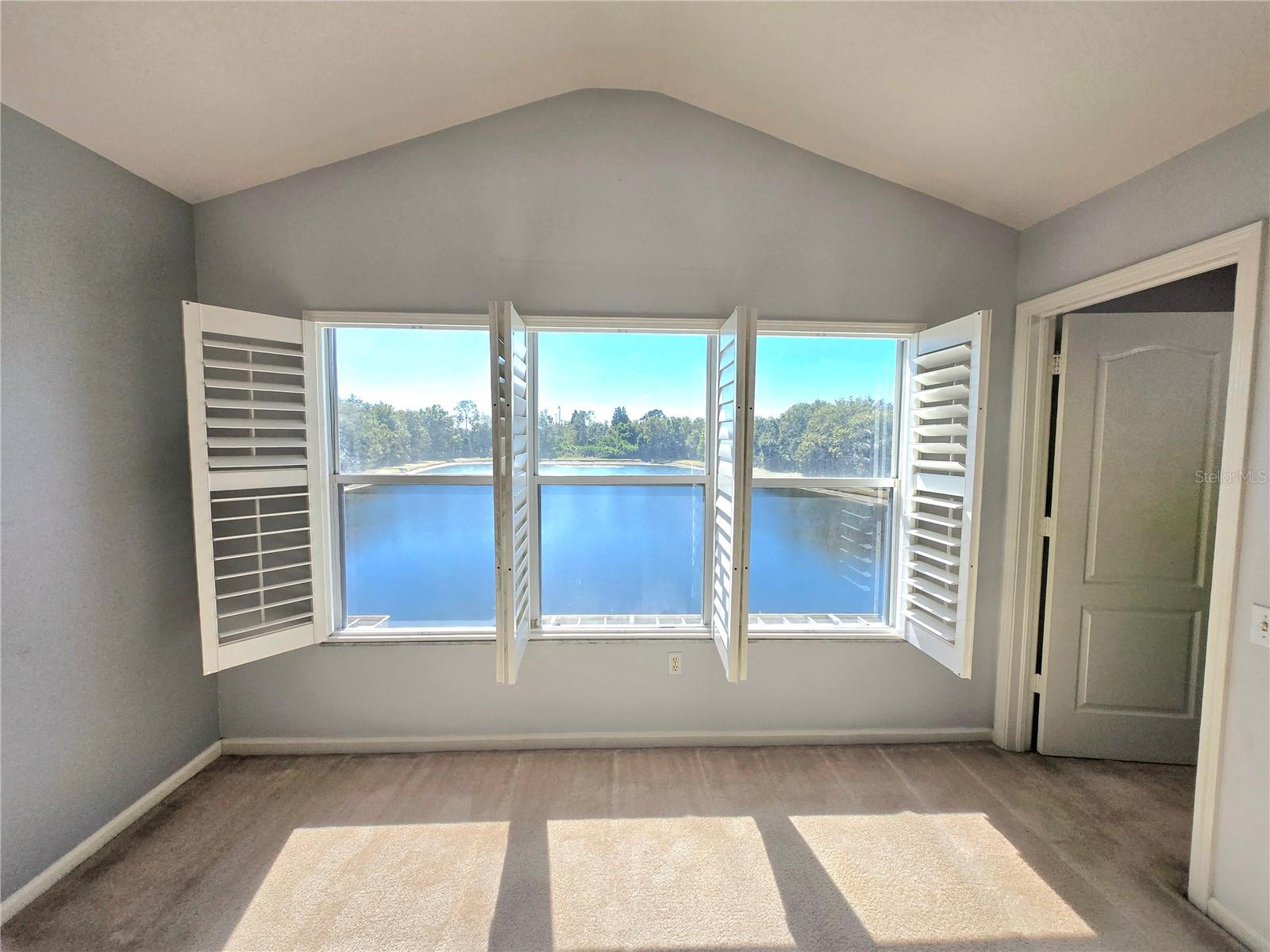 Actual stunning Waterview from Master Bedroom. Gorgeous natural lighting.