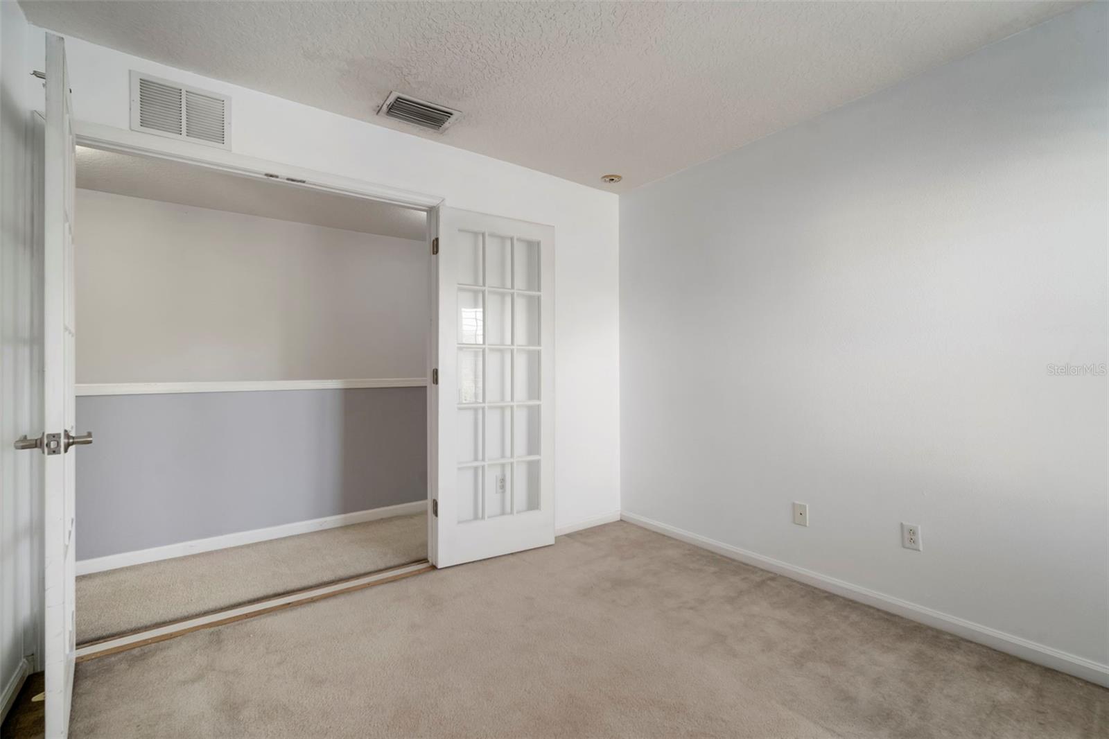 Entrance to 3rd Bedroom. Easy flex space with closet.