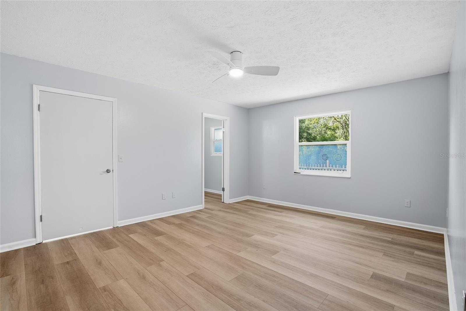 spacious pimary bedroom with HUGE closet or den or nursery or whatever you want