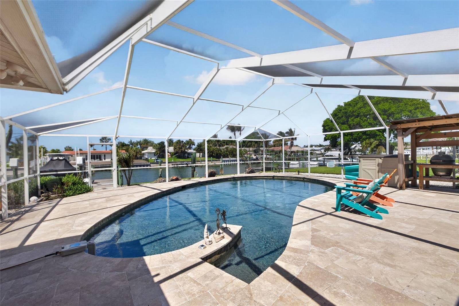 Sparkling blue water with swim up bench