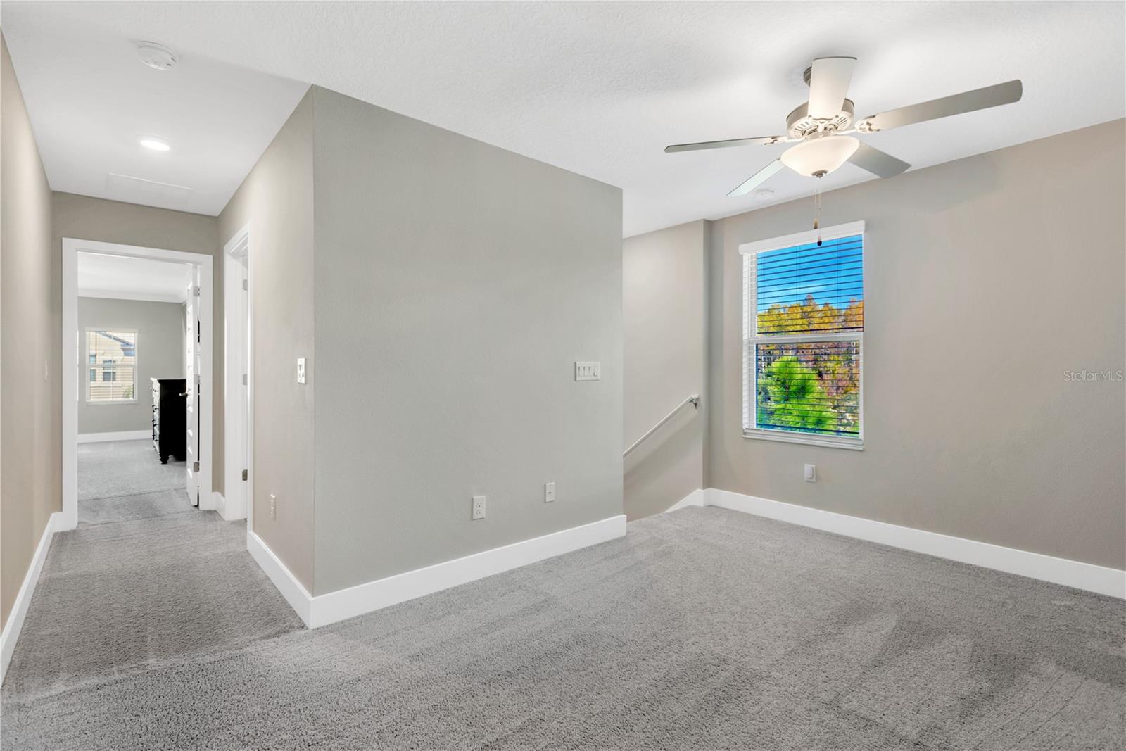 Upstairs Loft with view to primary bedroom