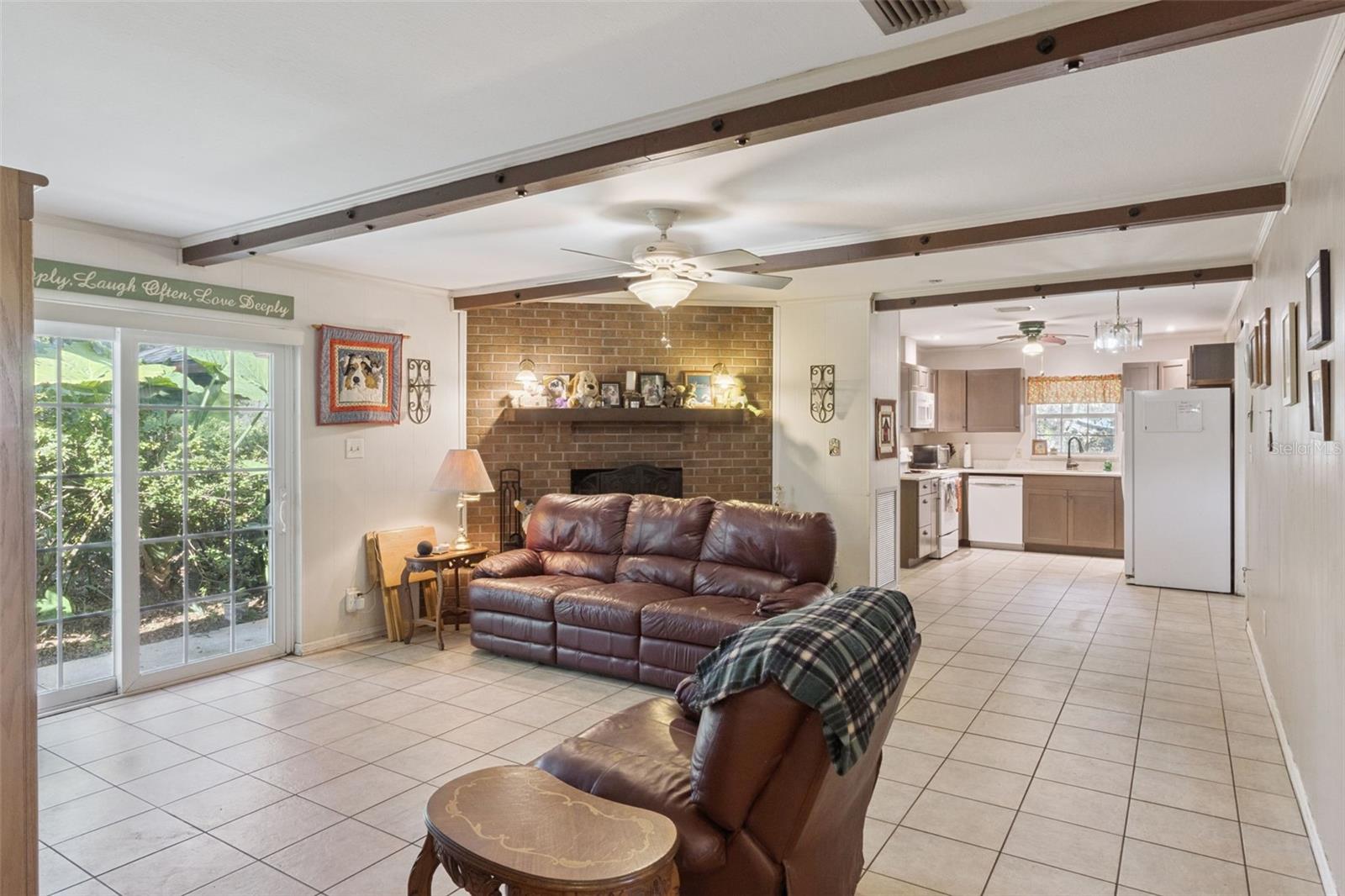 Great Room with Sliding doors to back yard and pool