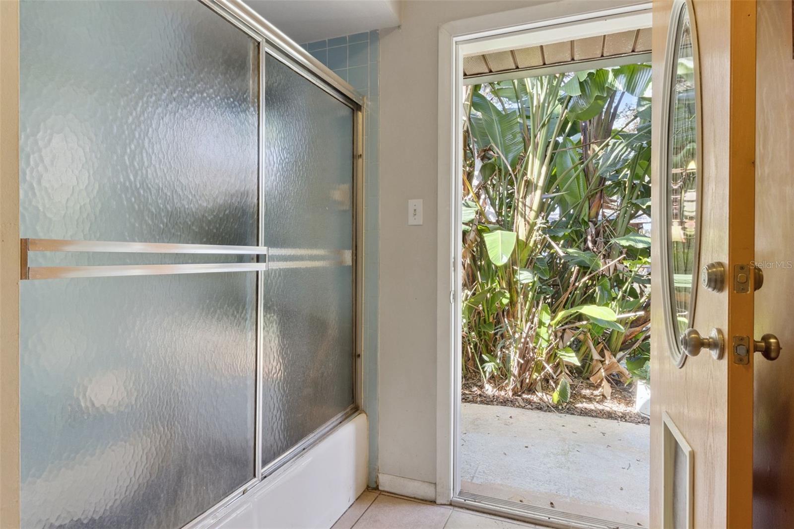 Back door off Guest bathroom