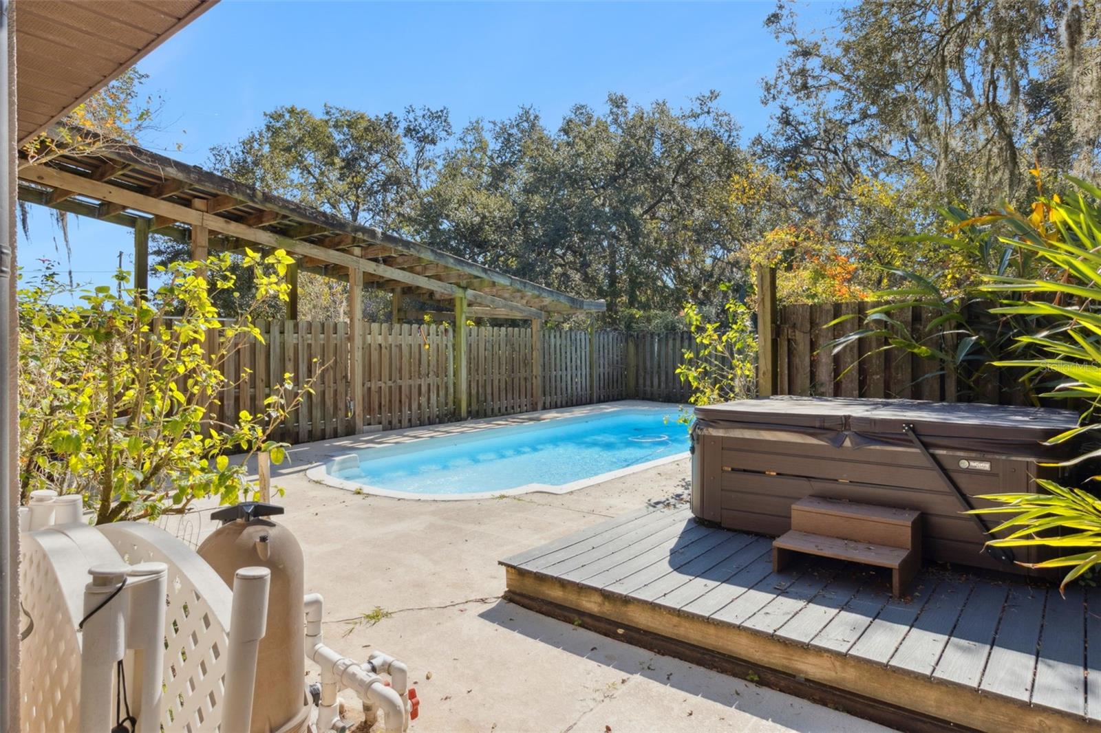 Privacy fenced pool and hot tub