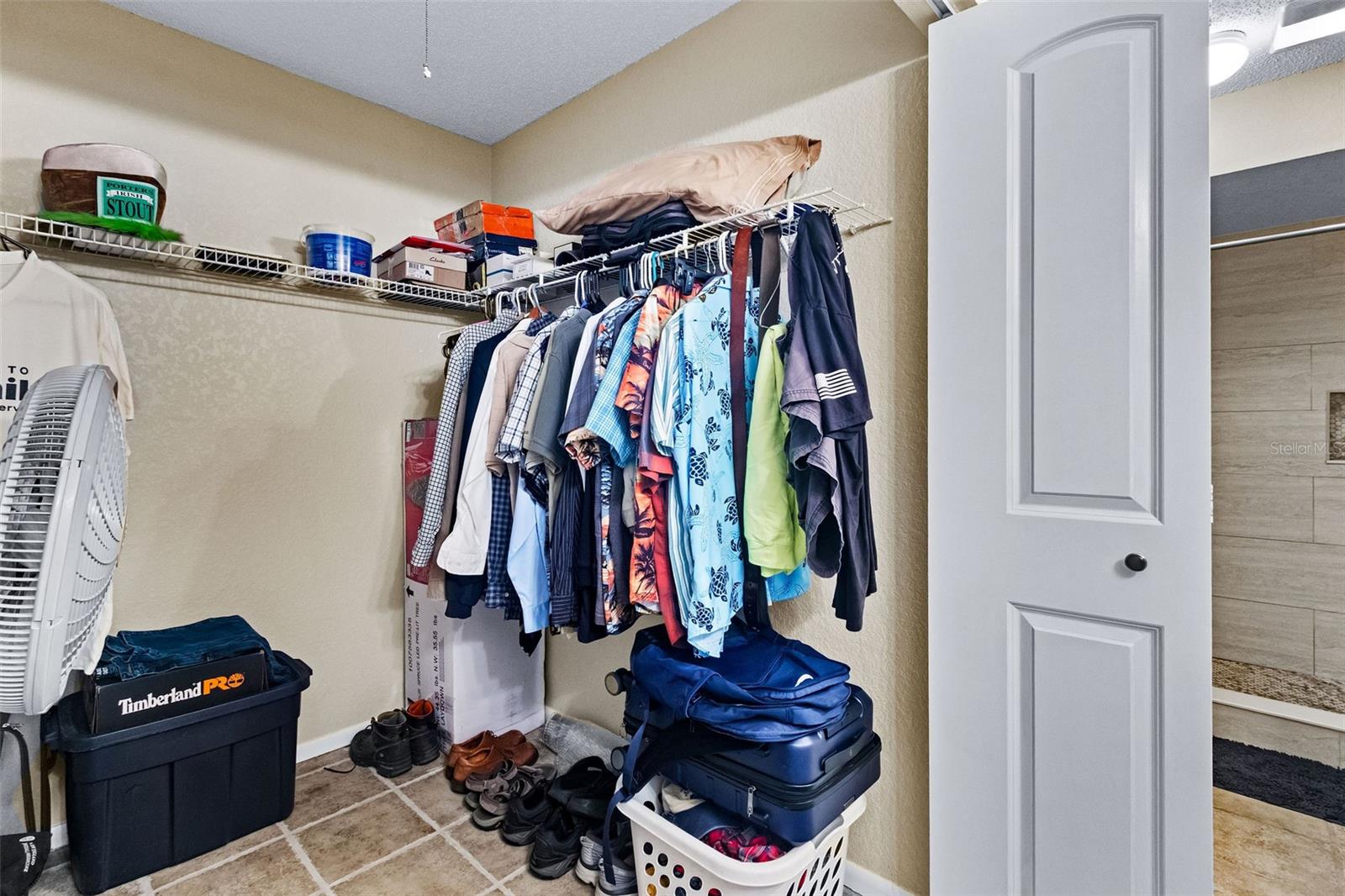 Primary walk in closet.