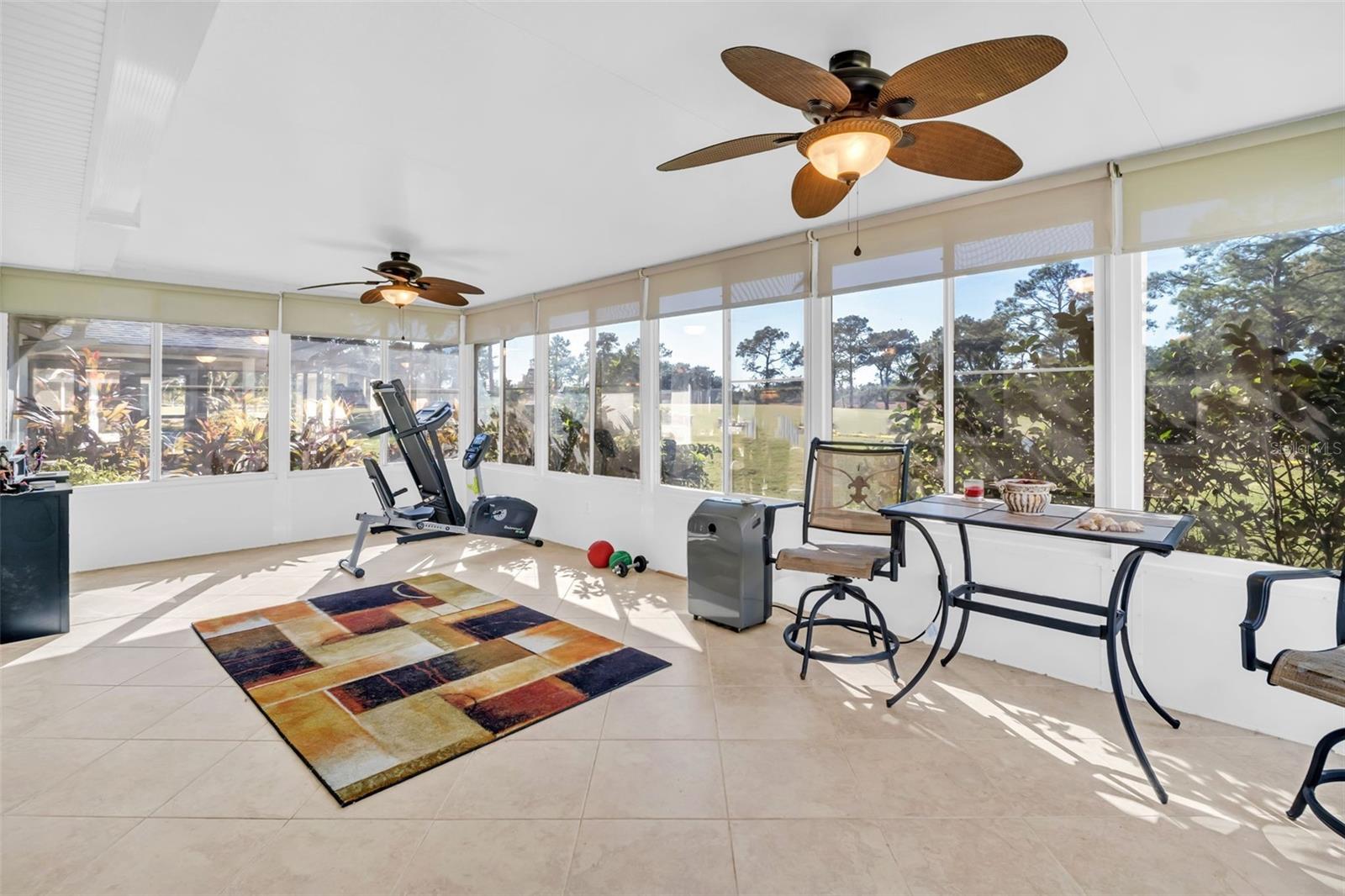 WOW!! What a view - a wall of windows overlooking the White course - Hole #2!!!