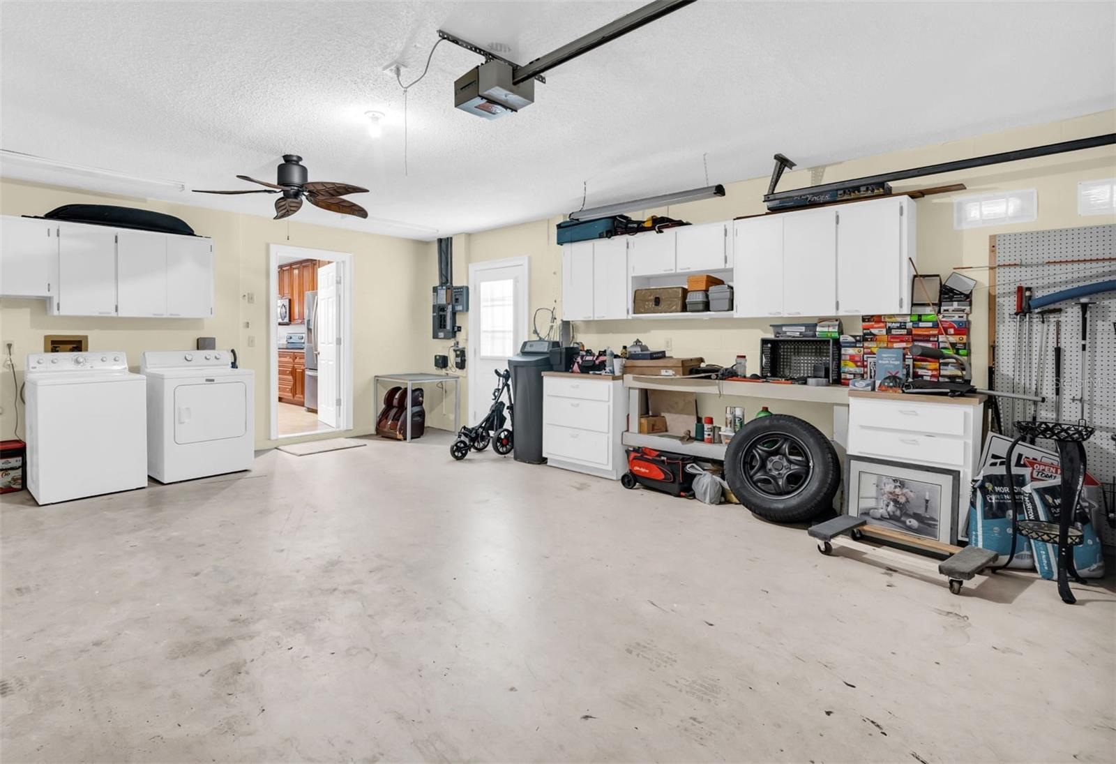 Large double garage with washer/dryer and brand-new hot water heater.  House has passed a 4-point inspection which is attached as a document to this MLS listing.