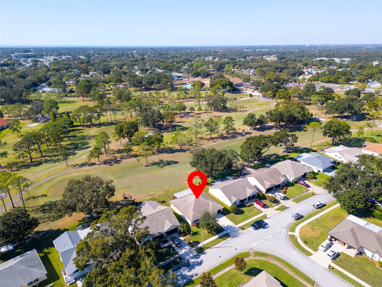 Close enough to enjoy the view but no golf carts right in your backyard!