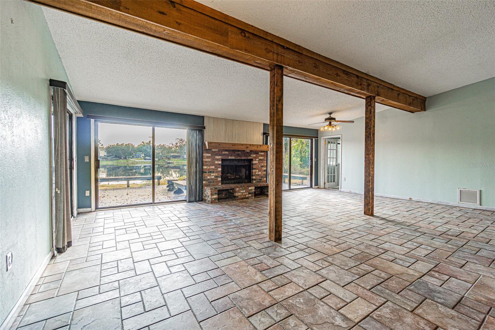Large living room with fireplace.