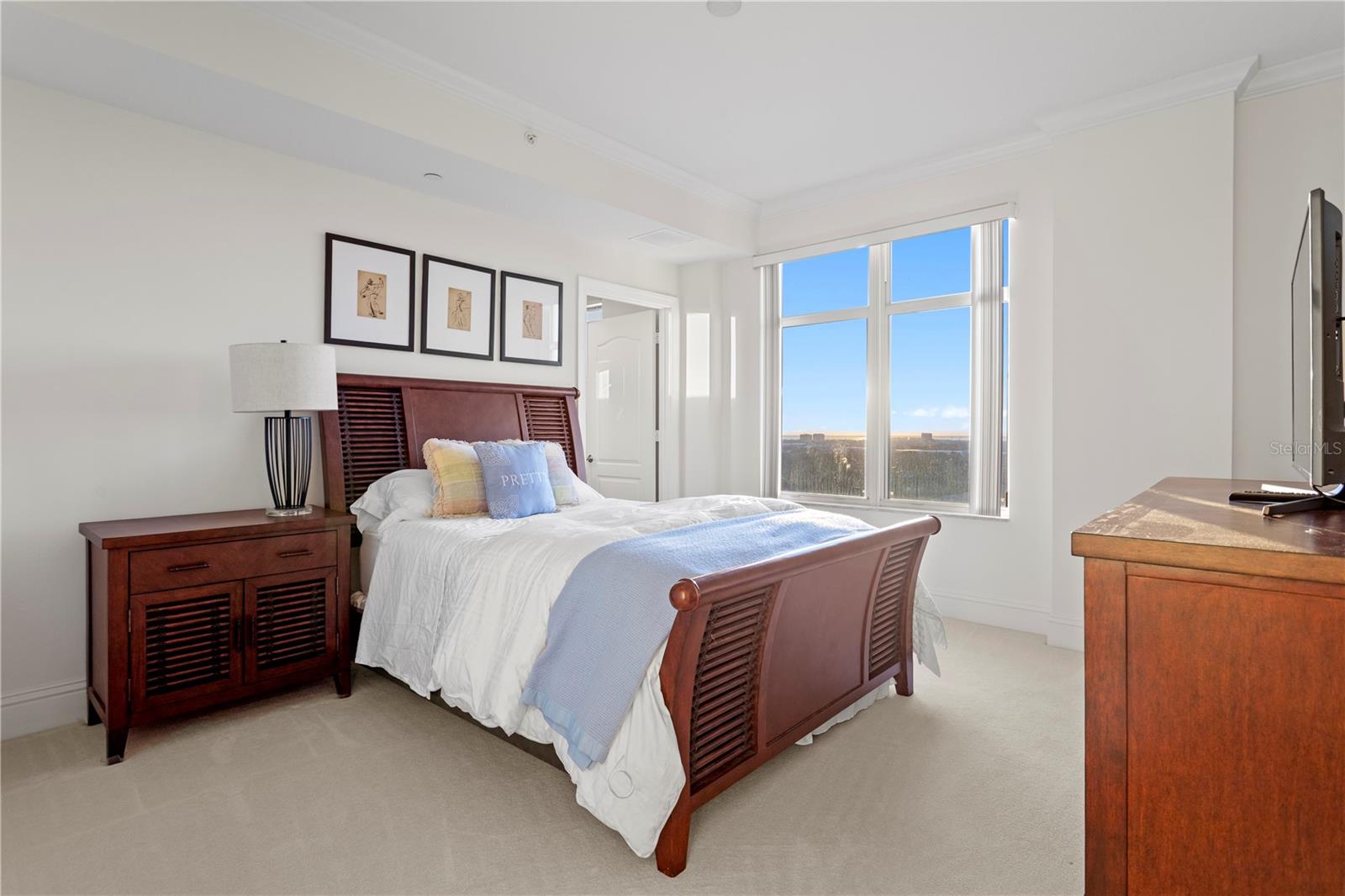 The second bedroom with ensuite bathroom and walk in closet