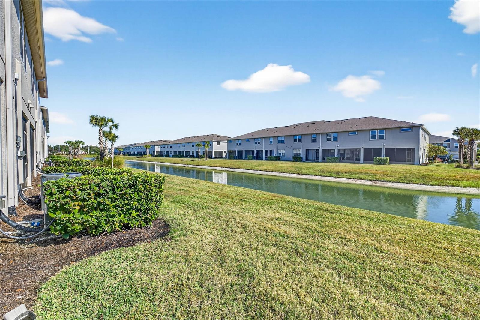 Rear yard view of pond