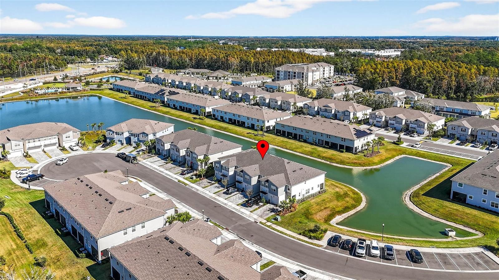 Aerial view of townhome  & neighborhood