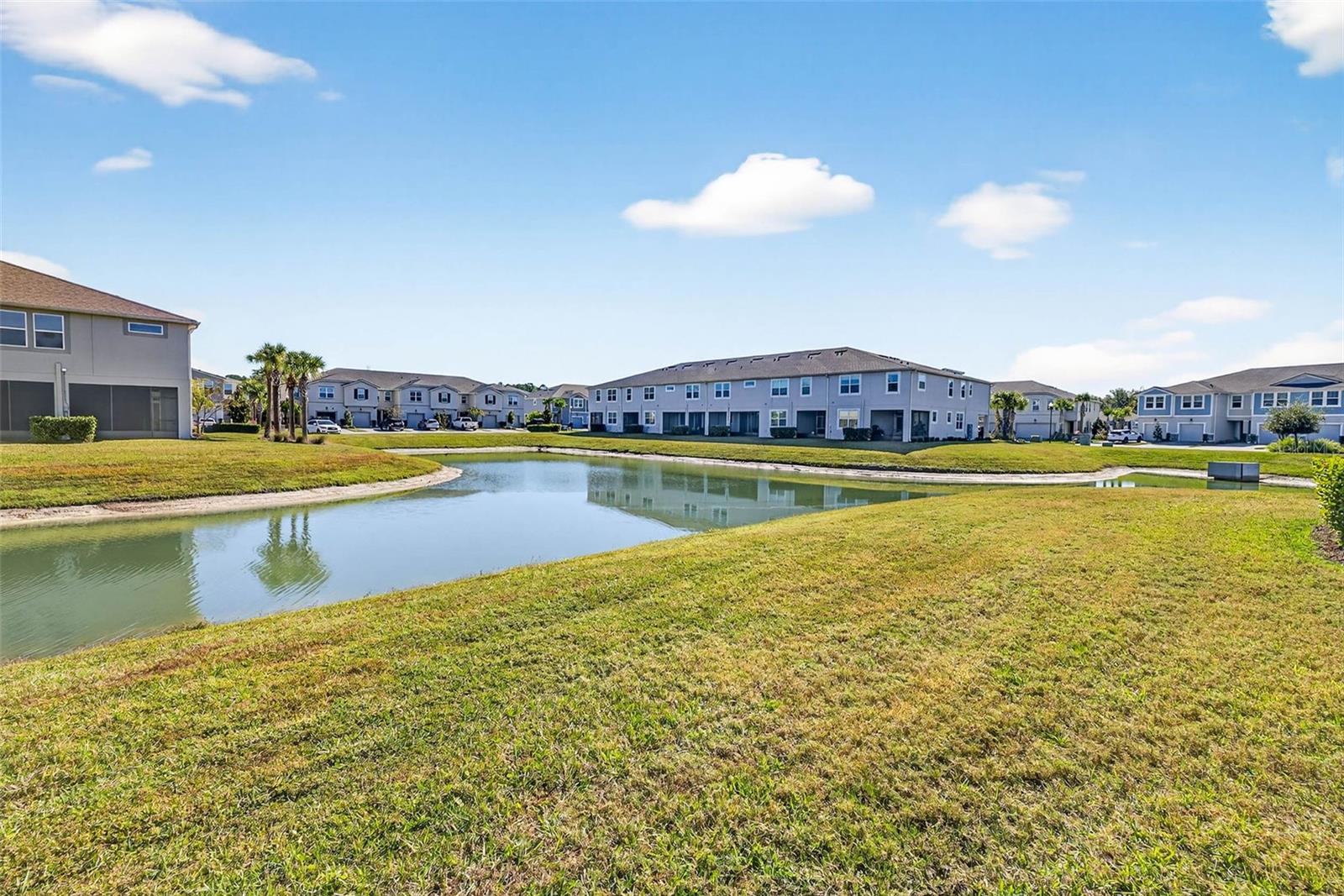 Rear yard view of pond