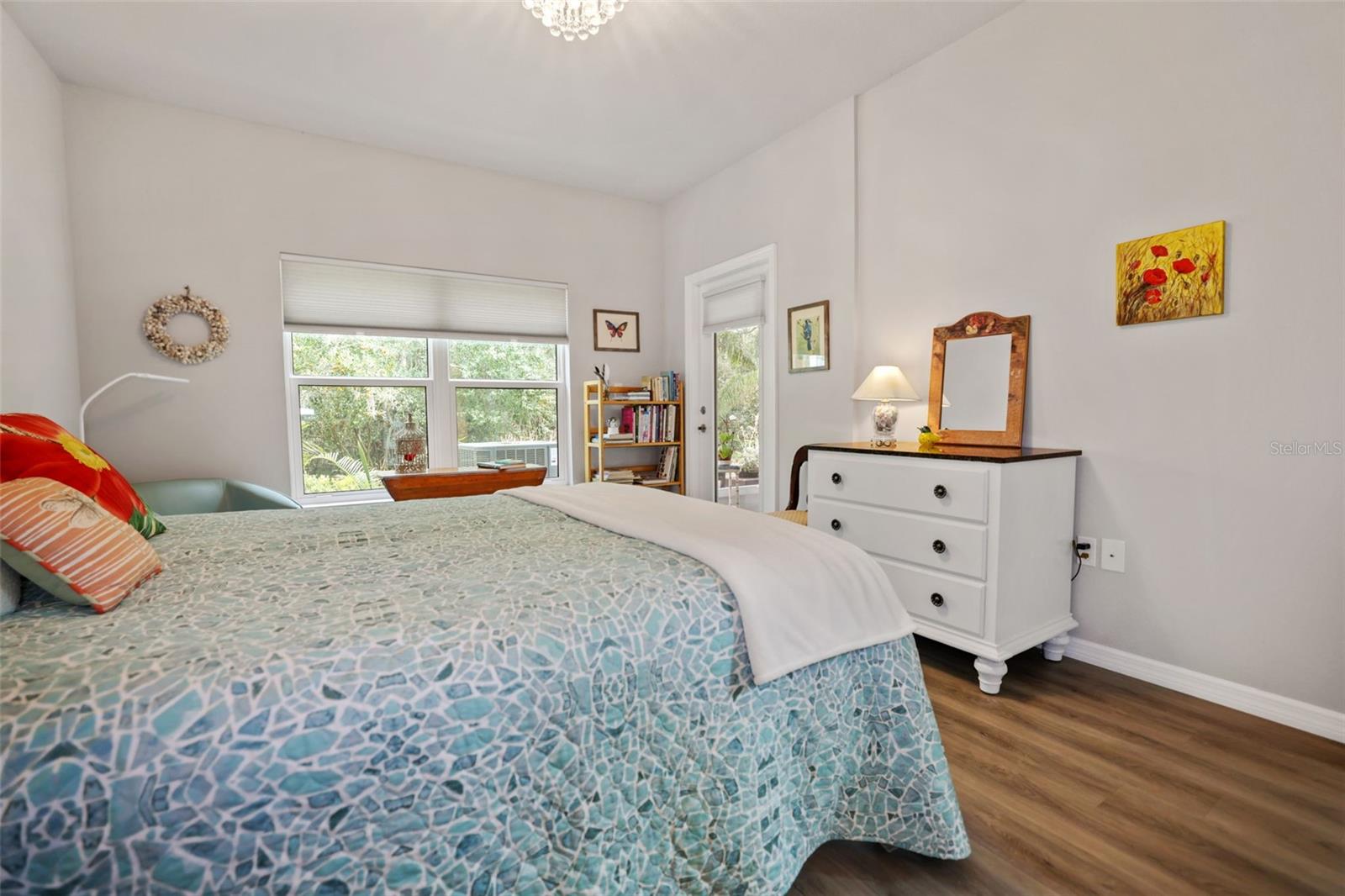 Primary bedroom with view of nature preserve