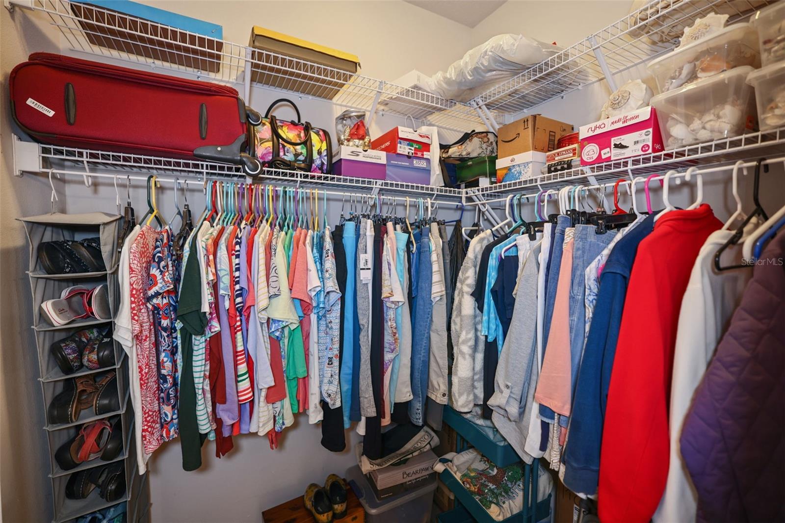 Walk in closet in primary bathroom