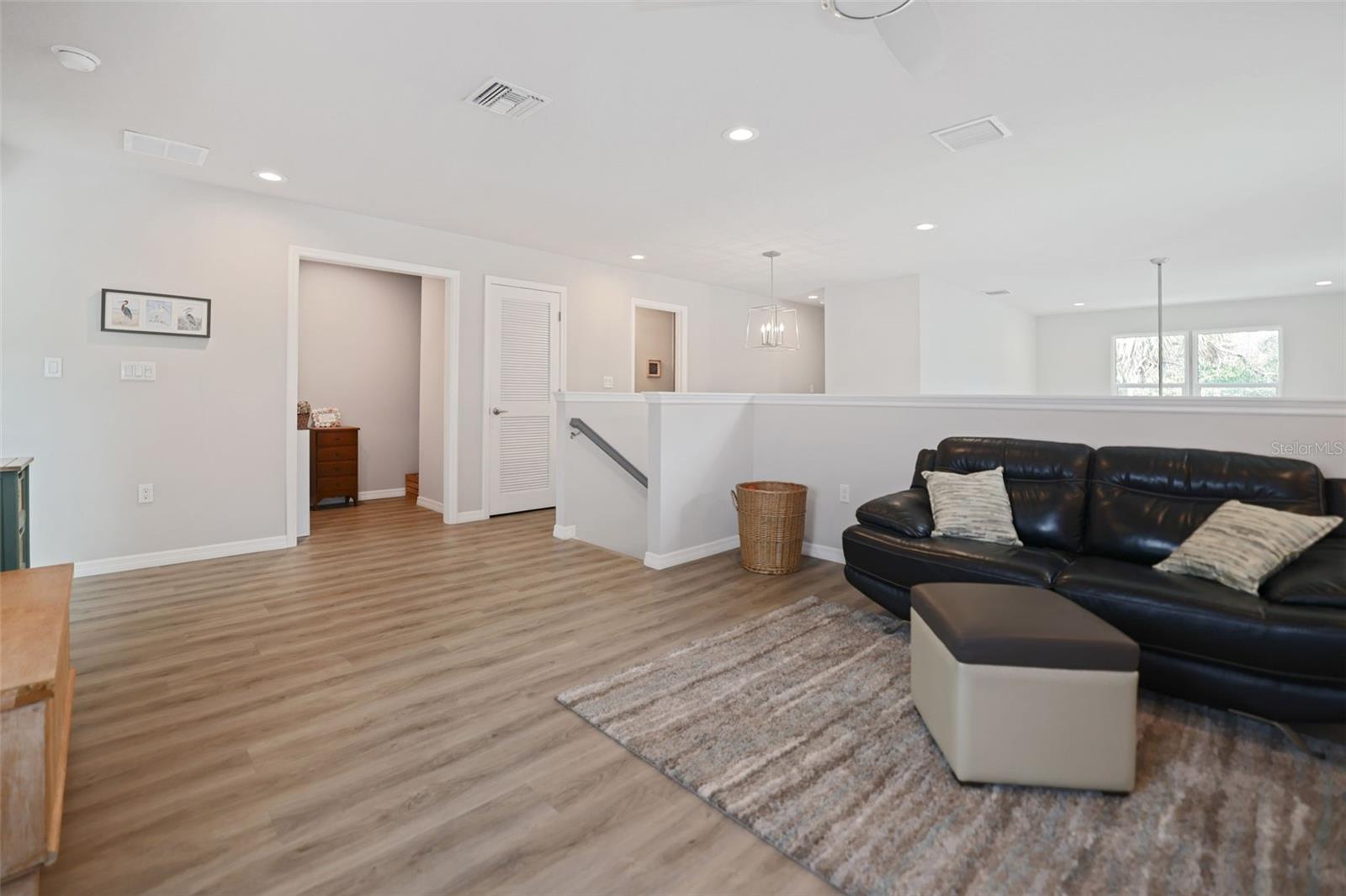 Loft view from windows toward a storage area
