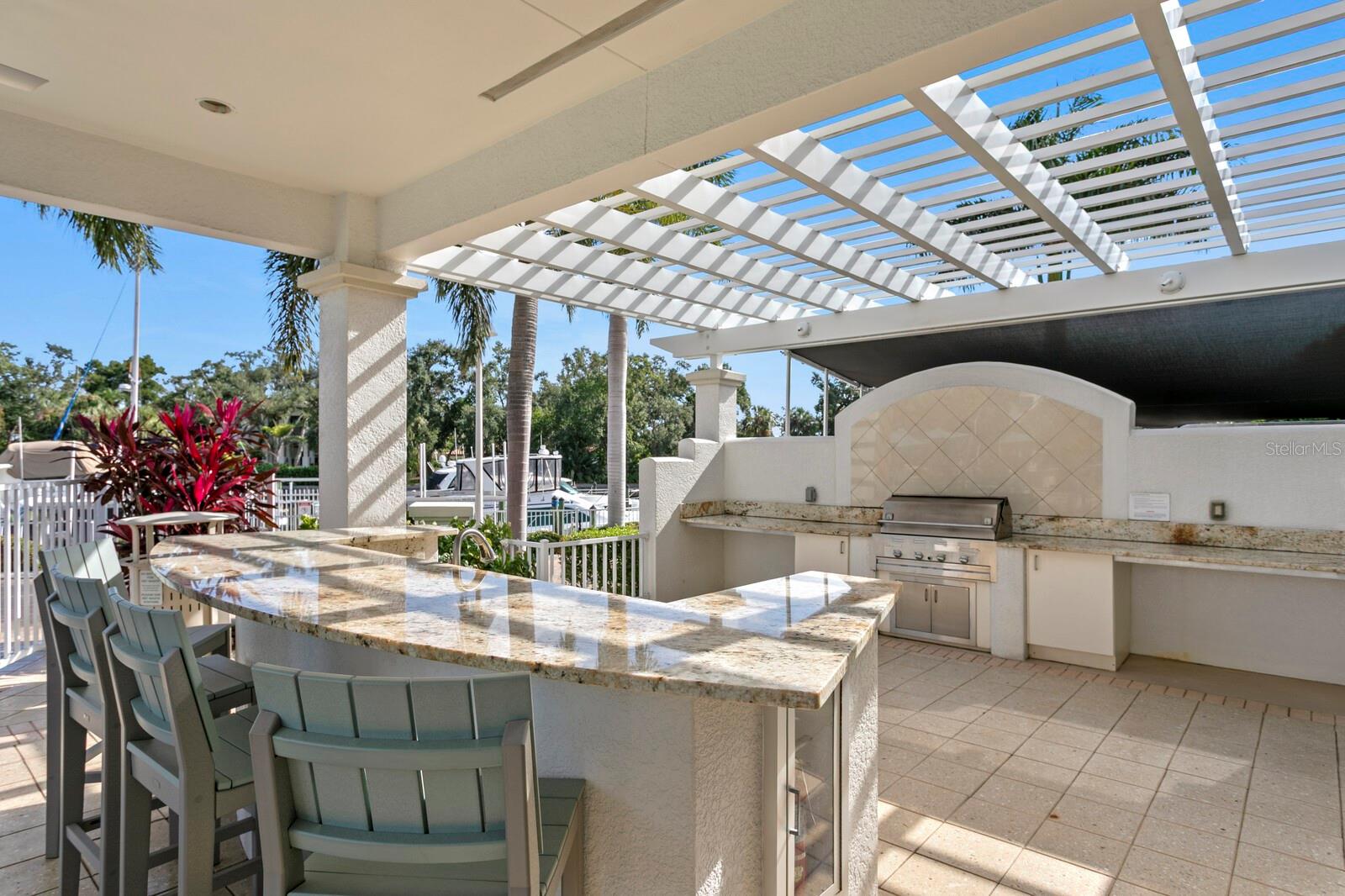 Pool Side Outdoor kitchen with Water Views