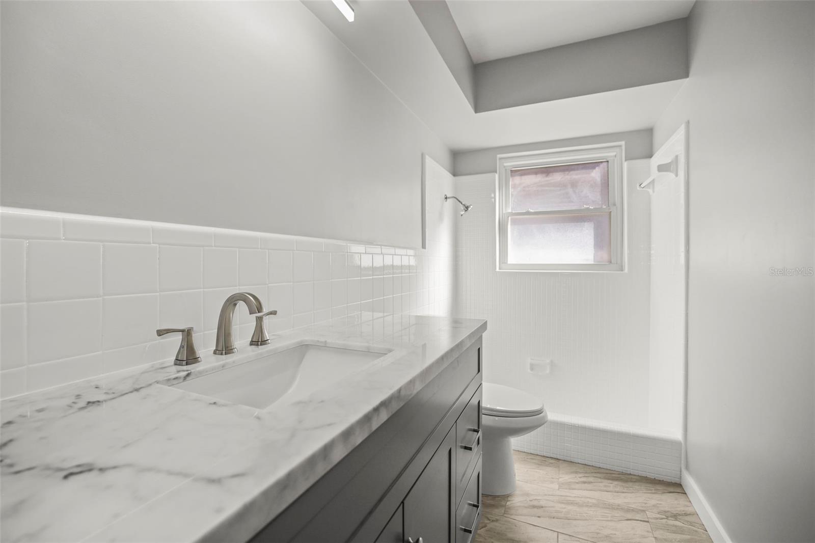 2nd Bathroom with step down tub