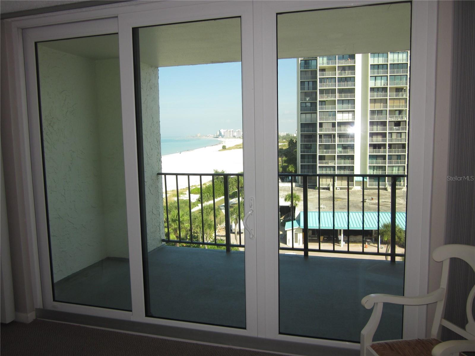 3 sets of newer hurricane impact sliding doors to balcony