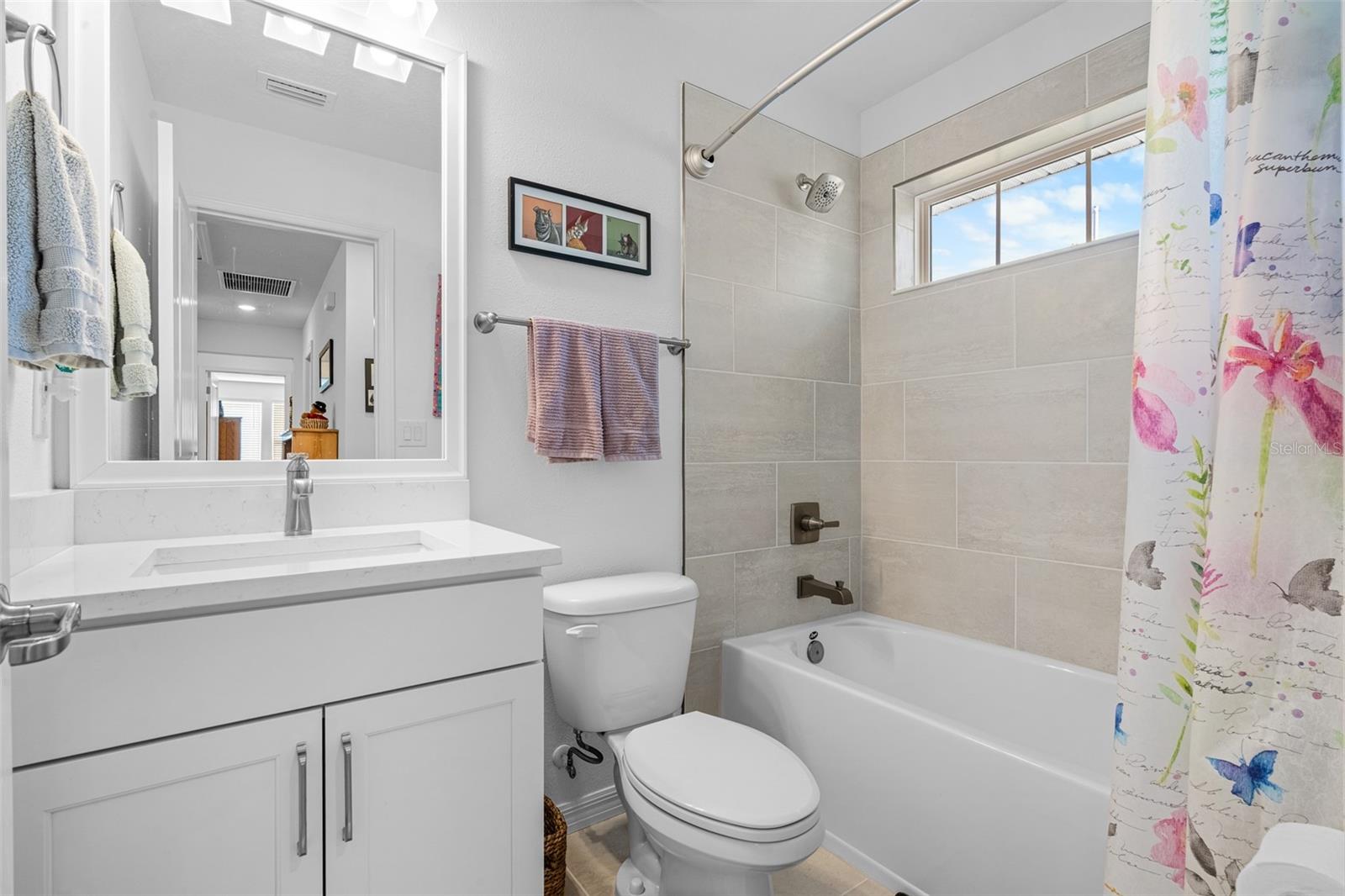 Full upstairs bath shared by bedrooms 2 and 3