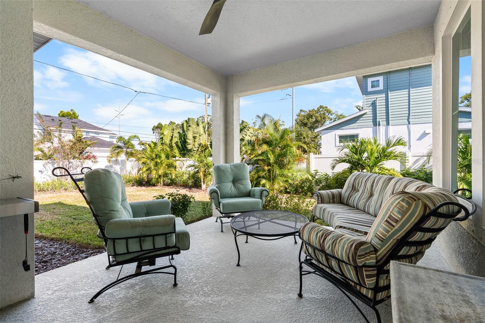 Shaded back patio is the perfect place to relax!