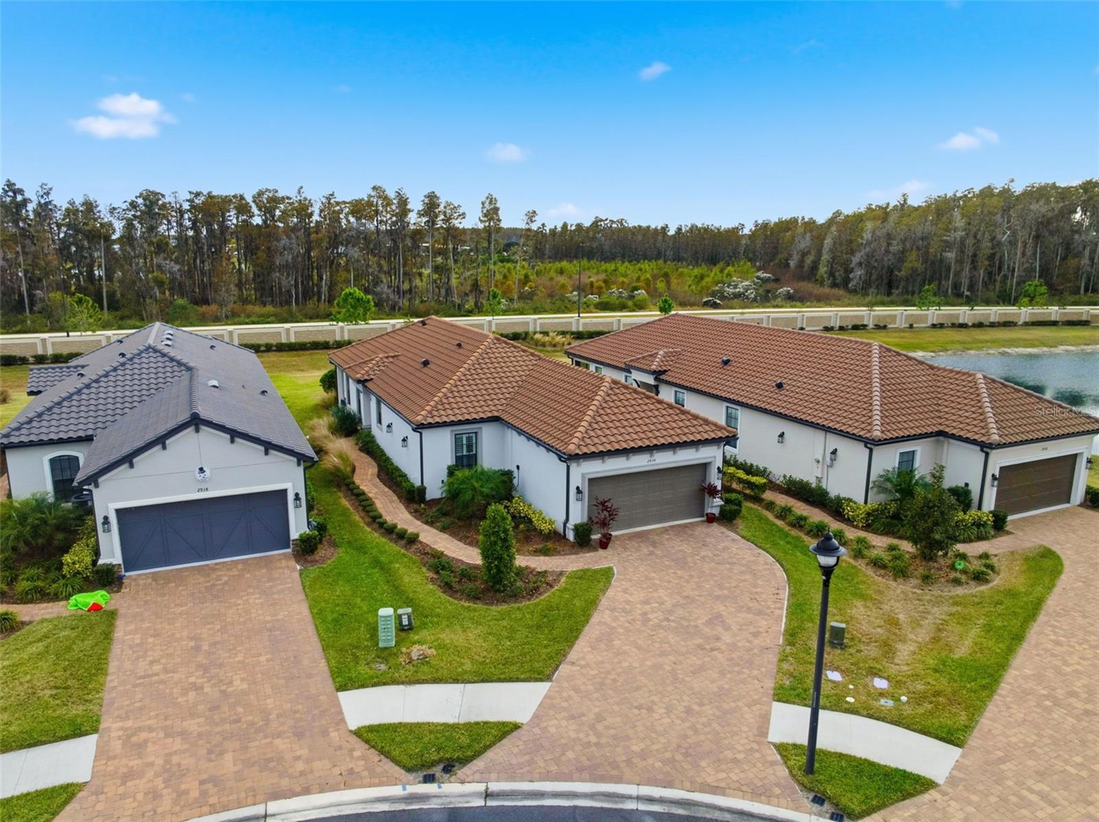 Aerial front view (middle house is subject property)