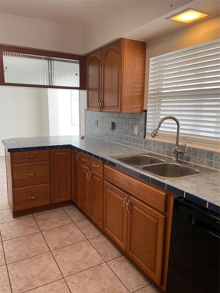 Kitchen viewed from door to garage.