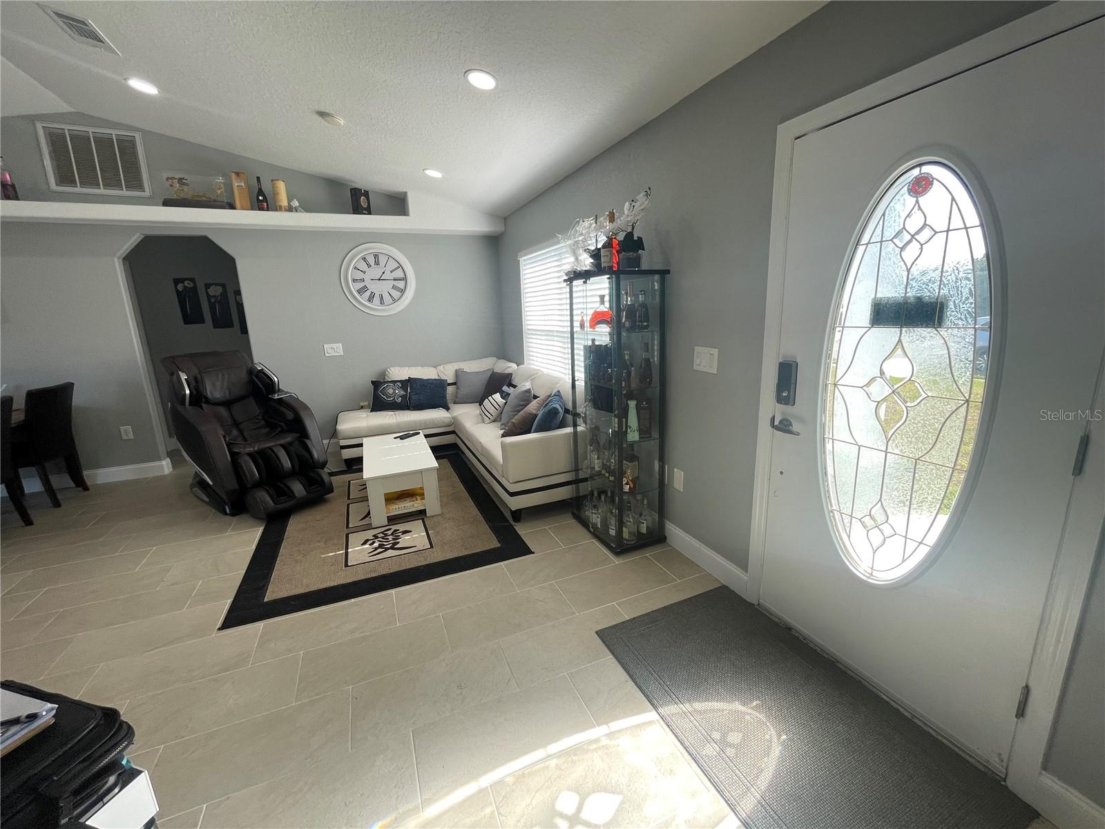 DOOR ENTRNACE AND LIVING ROOM