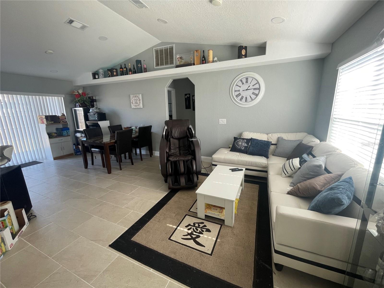 LIVING ROOM, DINING AT THE LEFT