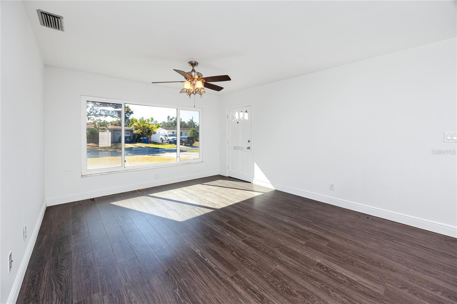 Beautiful natural light spills in through the large front windows. Great space to enjoy a coffee with the sun on your face.