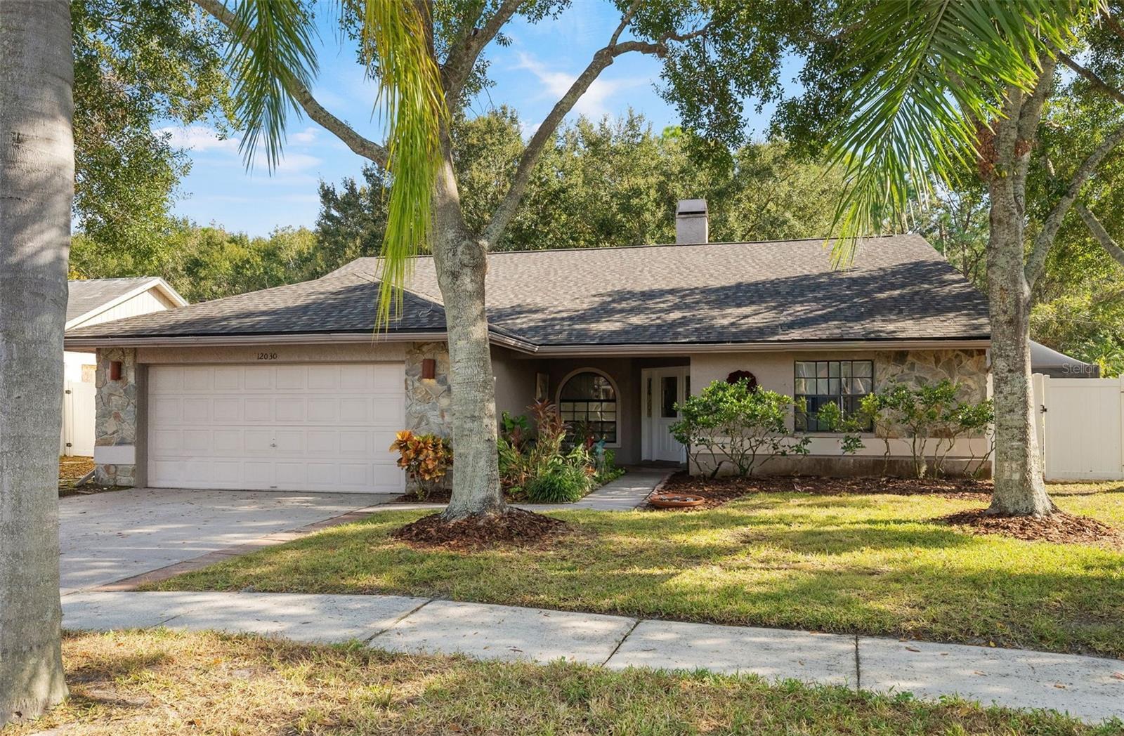 4 BR/2 BA Pool home with newer roof (2024) on a conservation lot! Highly-rated school district, too!