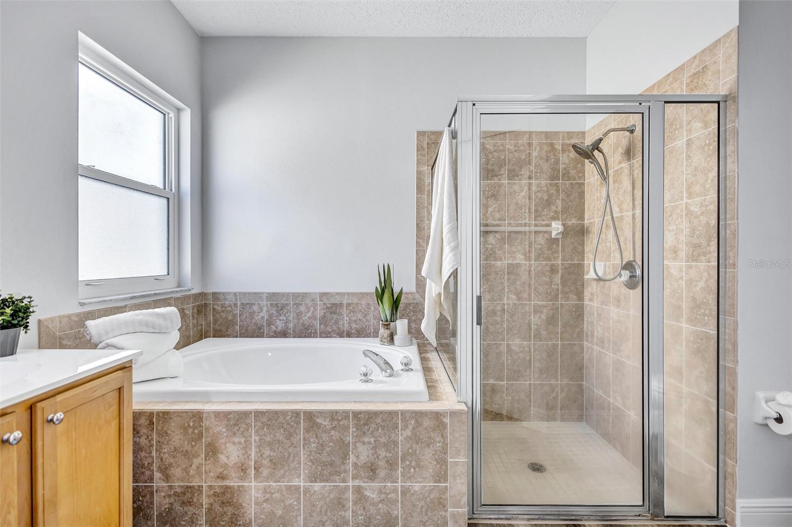 Attached garden tub and walk-in shower